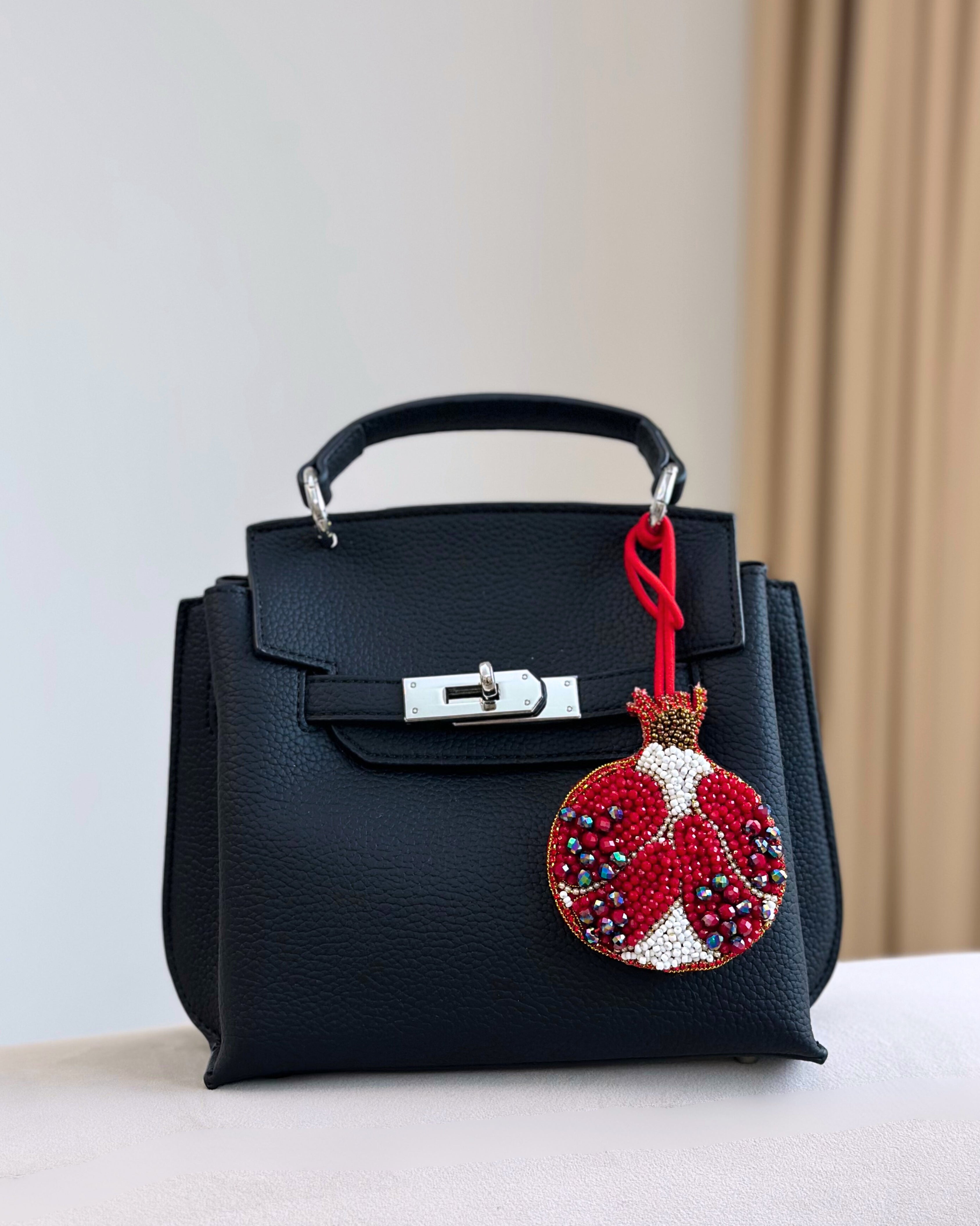 The Pomegranate Charm