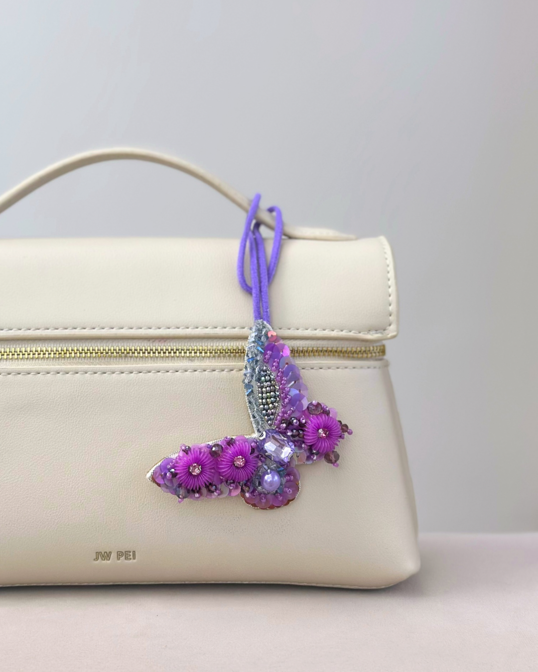 Jasmine Butterfly Charm